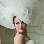 bridal hairstyle updo with pouf veil